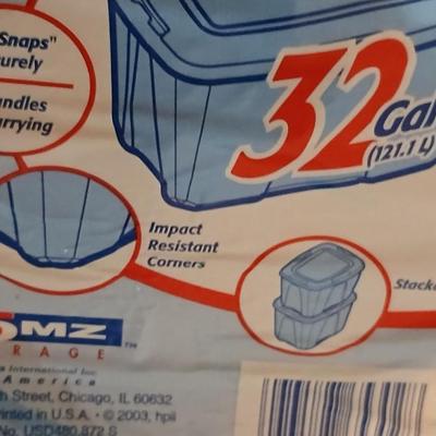 Two 32 gallon storage totes with lids and three milk like crates