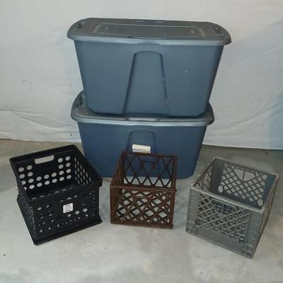Two 32 gallon storage totes with lids and three milk like crates