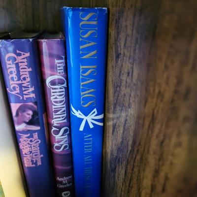 Shelves of books - mostly vintage hardbacks with Dust Jackets