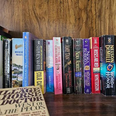 Shelves of books - vintage hardcovers - shelf of paperbacks - Autographed Reeves Broncos book!