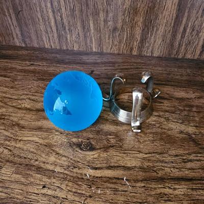 Vintage glass globe paper weight with stand and two World Atlas hardback books