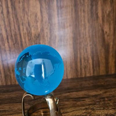 Vintage glass globe paper weight with stand and two World Atlas hardback books