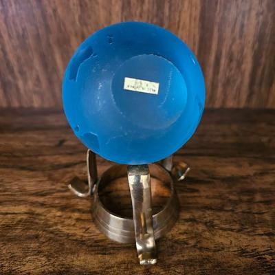 Vintage glass globe paper weight with stand and two World Atlas hardback books