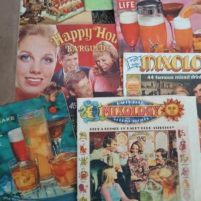 Some way cool vintage cookbooks and pamphlet like cook & drink mixing books