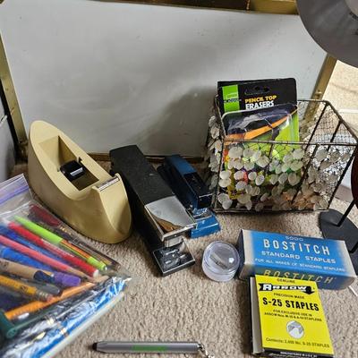 Large assortment of office supplies with metal storage, adding machine, lamp and more