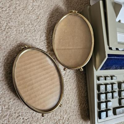 Large assortment of office supplies with metal storage, adding machine, lamp and more