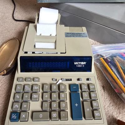 Large assortment of office supplies with metal storage, adding machine, lamp and more