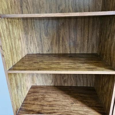 Nice sturdy bookshelf with under-storage. They don't make them like this anymore!!