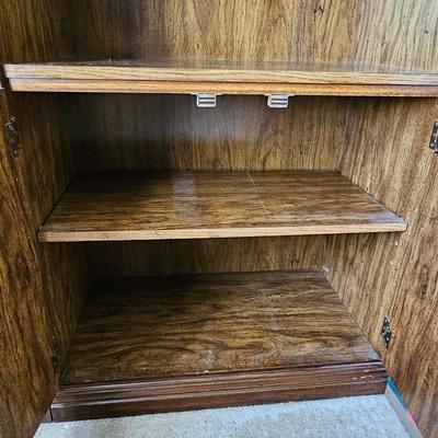 Nice sturdy bookshelf with under-storage. They don't make them like this anymore!!
