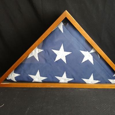 USA Flag in Memorial triangle display box with a black framed diplay box