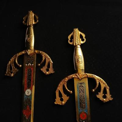 Two metal decorative swords