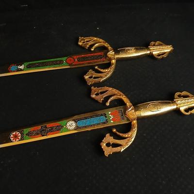 Two metal decorative swords