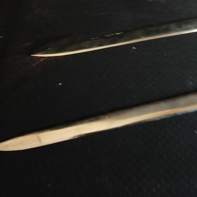 Two metal decorative swords