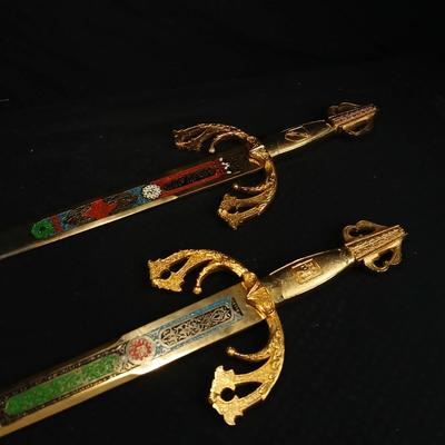 Two metal decorative swords