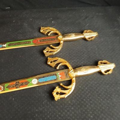 Two metal decorative swords