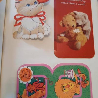 Two scrapbooks FULL of the cutest and funest vintage cards for all holidays!