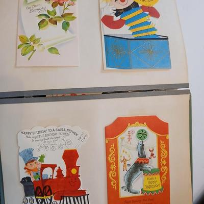 Two scrapbooks FULL of the cutest and funest vintage cards for all holidays!