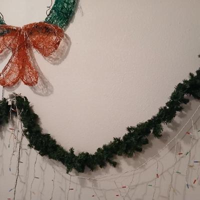LARGE over 35" Christmas wreath, with two strands of garland and two strands of multi color Icicle lights