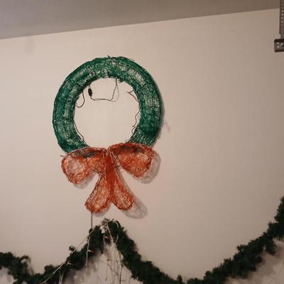 LARGE over 35" Christmas wreath, with two strands of garland and two strands of multi color Icicle lights