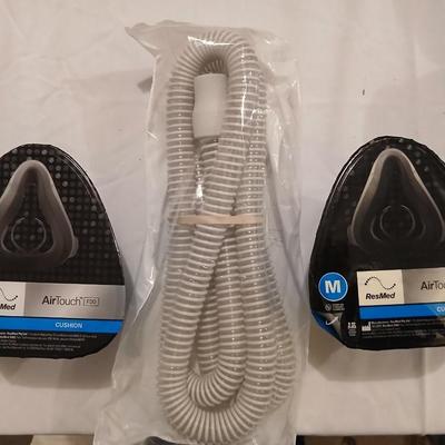 Two Medium AirTouch ResMed F20 cushions with one hose SEALED BRAND NEW