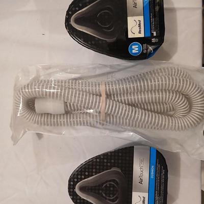 Two Medium AirTouch ResMed F20 cushions with one hose SEALED BRAND NEW