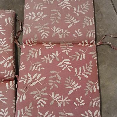 Four Patio furniture cushions
