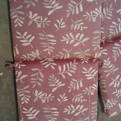 Four Patio furniture cushions