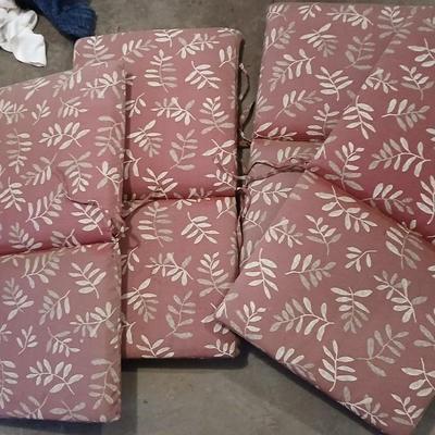 Four Patio furniture cushions