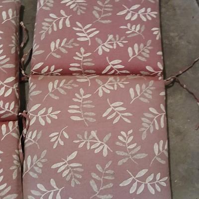 Four Patio furniture cushions