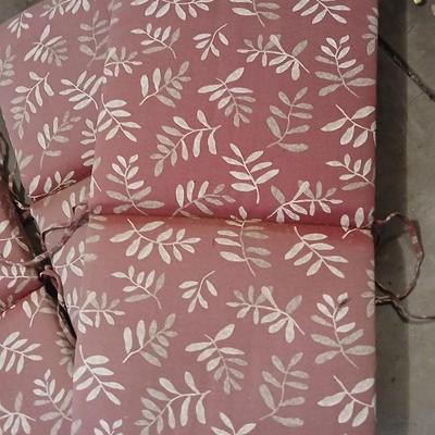 Four Patio furniture cushions