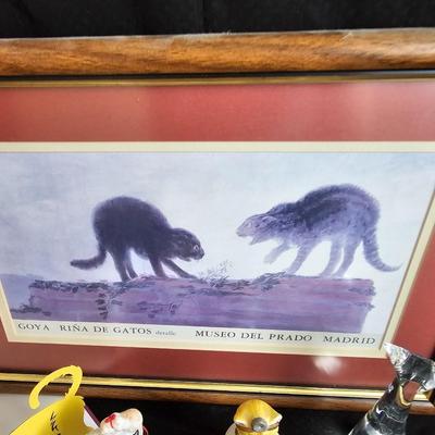 Everything cat! Cat figures, book with bookmarker, glass cat, and framed Goya Rina De Gatos detalle