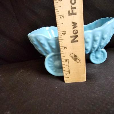 Vintage baby buggy planter with antique Bronzed baby shoes