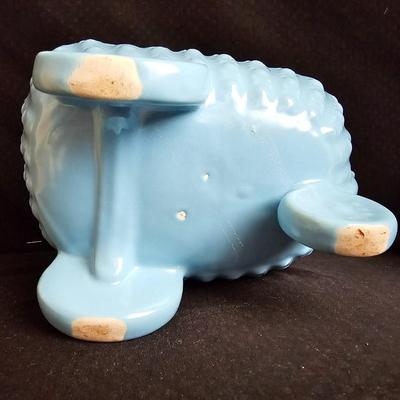 Vintage baby buggy planter with antique Bronzed baby shoes