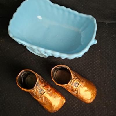 Vintage baby buggy planter with antique Bronzed baby shoes