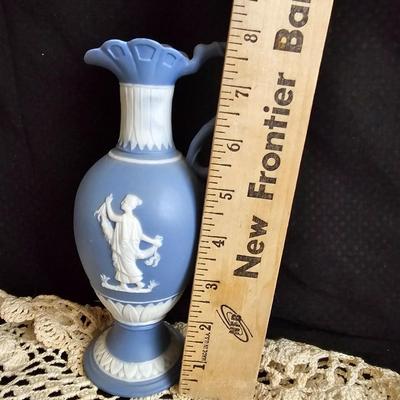 Vintage blue Jasperware vase with large handknitted Doiley