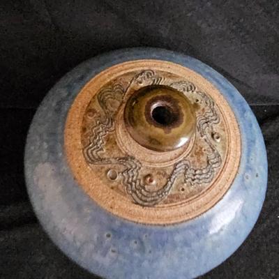 Pottery vase and a smaller tan ceramic vase