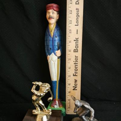 Golfing and skiing figures - tall wooden golfer - golfing trp[hy - and a pewter skier
