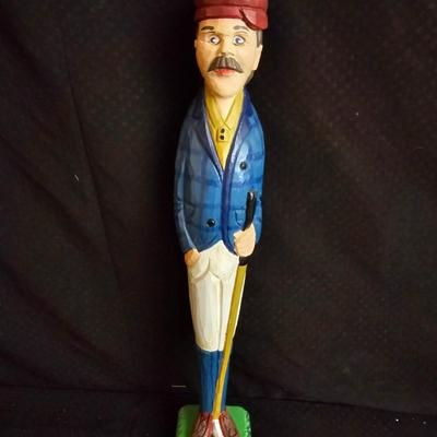 Golfing and skiing figures - tall wooden golfer - golfing trp[hy - and a pewter skier