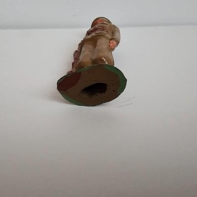 Queen Elizabeth toffee tin - made in England and a vintage lead soldier figure