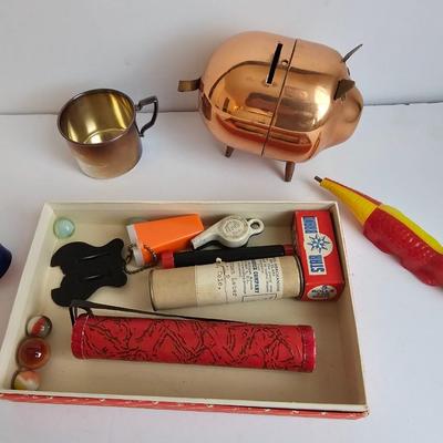 Lots of vintage child trinkets - Star brand roll caps box - old marbles - Brass piggy bank - silverplated child's mug, 1947 Captain...