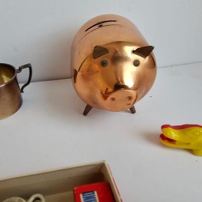 Lots of vintage child trinkets - Star brand roll caps box - old marbles - Brass piggy bank - silverplated child's mug, 1947 Captain...