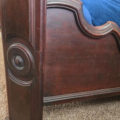 LOT 10: Antique Solid Wood Bed w/Ornate Details