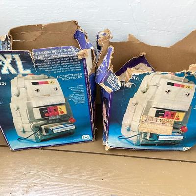 LOT 28: Pair of Vintage Mego 2XL Robots with Accessories