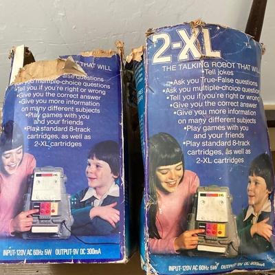 LOT 28: Pair of Vintage Mego 2XL Robots with Accessories