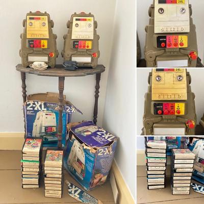 LOT 28: Pair of Vintage Mego 2XL Robots with Accessories