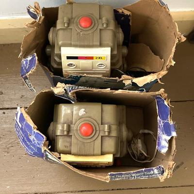 LOT 28: Pair of Vintage Mego 2XL Robots with Accessories