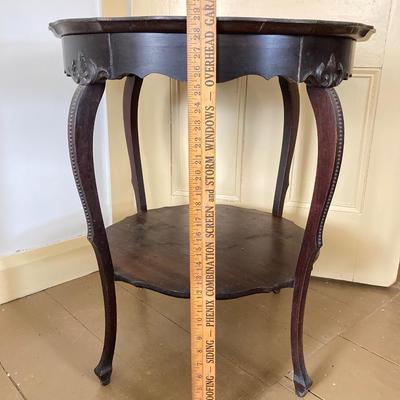 LOT 40: Vintage Carved Wood Round Two Tiered Table