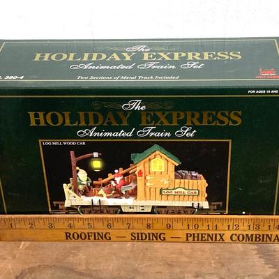 LOT 42: The Holiday Express Animated Train Set Pieces in Original Boxes (Post Office Car, Water Tanker Skating Car, Bakery Car, Log Mill...