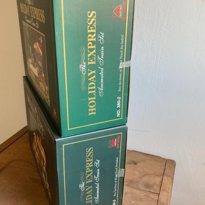 LOT 42: The Holiday Express Animated Train Set Pieces in Original Boxes (Post Office Car, Water Tanker Skating Car, Bakery Car, Log Mill...