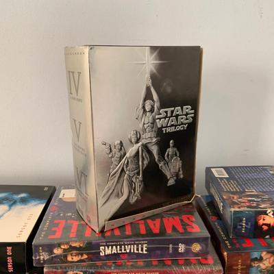 LOT 58: Large Collection of DVD's Including Unopened Box Sets and More